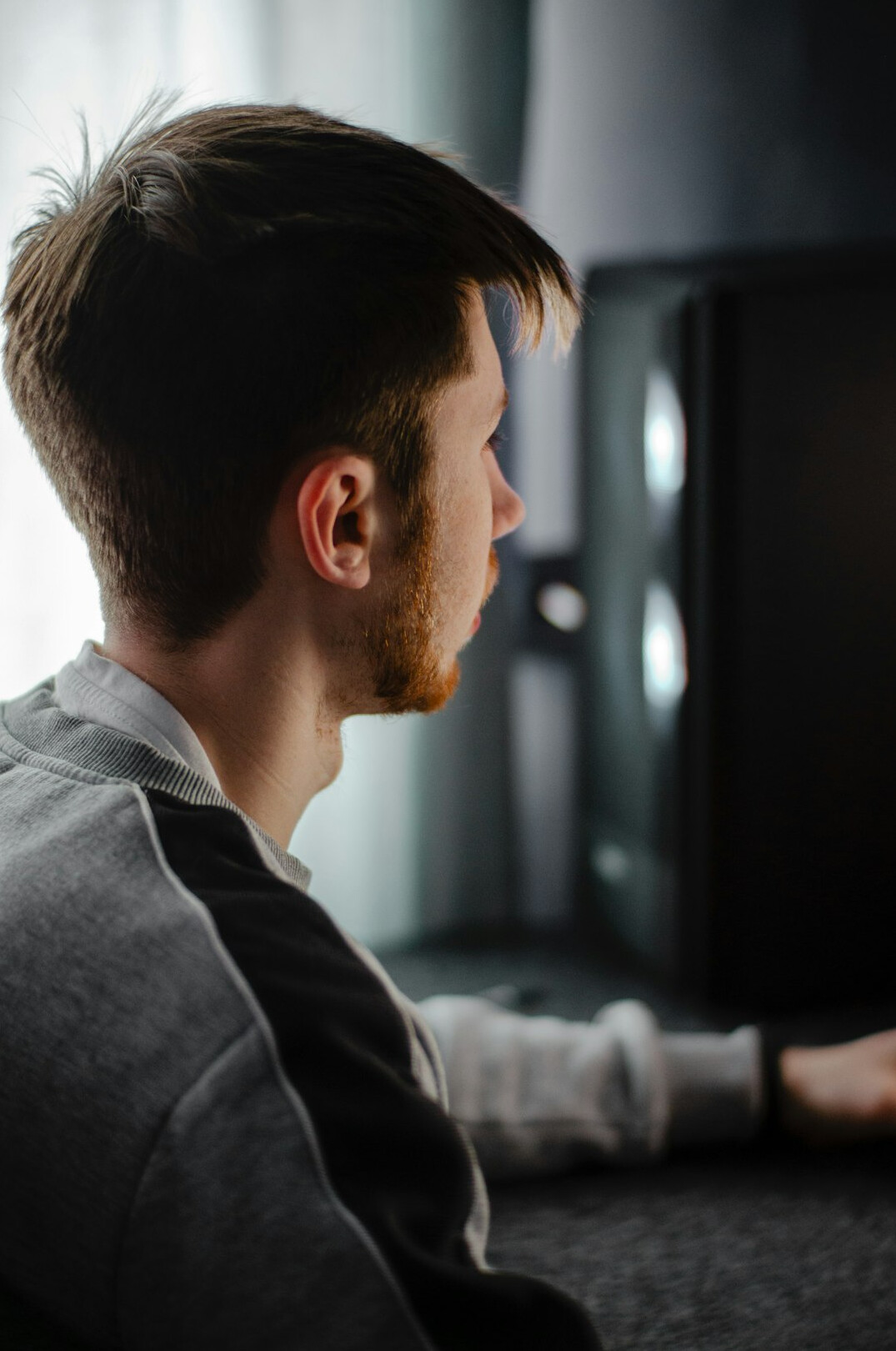 man watching tv drama