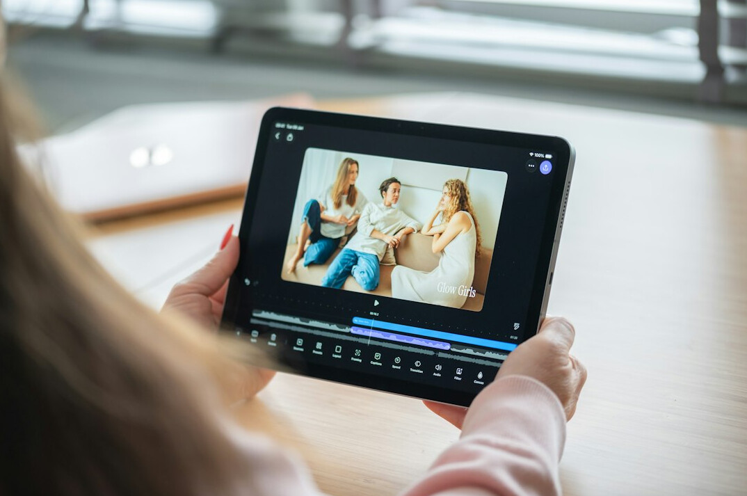 person streaming on tablet